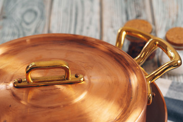 New copper cookware for professional kitchen close up