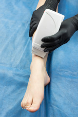 Procedure for waxing female parts of the body in a beauty salon.