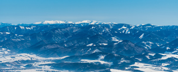 Nizke Tatry and Velka Fatra mountains from sedlo Okopy saddle in winter Mala Fatra mountains in Slovakia © honza28683