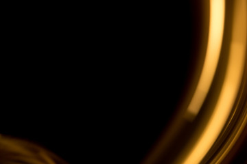 Abstract, colored light patterns and patterns in the form of simple elements on a black background