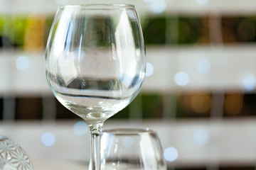 Empty wine glass on a restaurant table