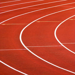 Abstract closeup view of a red running track