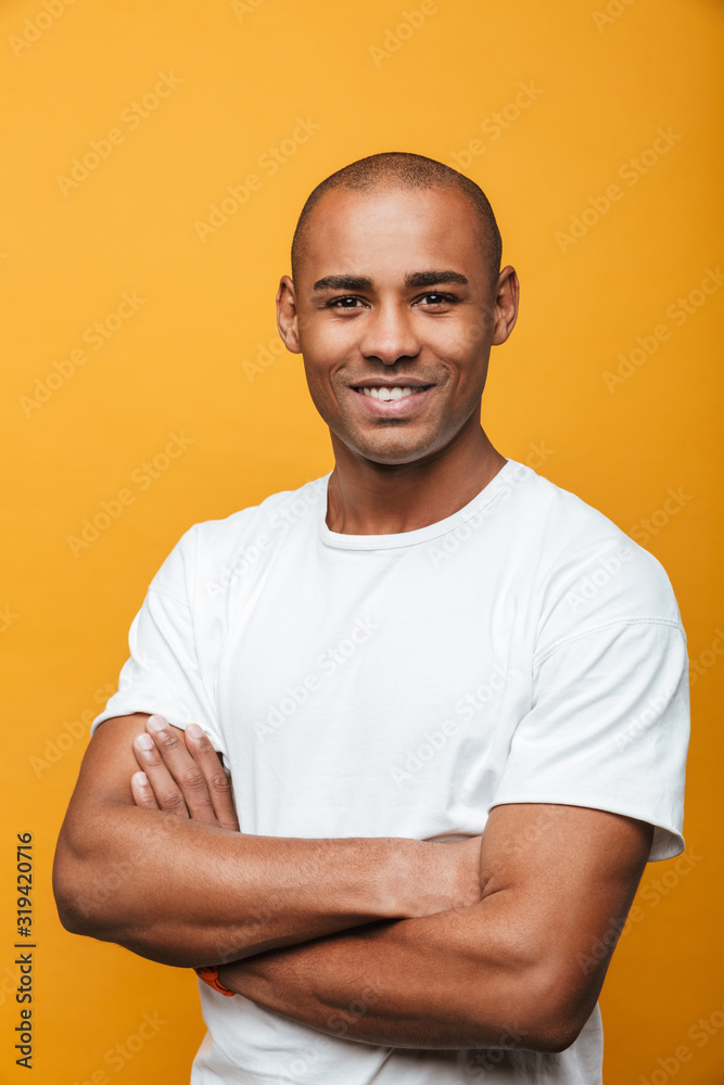 Wall mural Portrait of an attractive confident casual young man