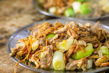 stir fried pork with green scallion and day lily,Chinese food.