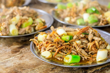 stir fried pork with green scallion and day lily,Chinese food.