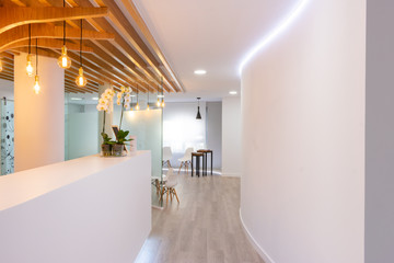 white decorated hallway to office entrance