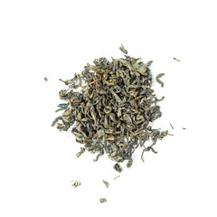 pile of natural ceylon whole leaf alpine green tea isolated on white background