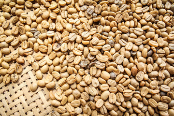 unroasted or green coffee beans background