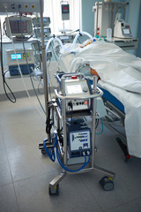 Patient in critical stance on a ventilator and ECMO pump due to RDS caused by virus pneumonia