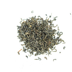 pile of natural chinese whole leaf green tea isolated on white background