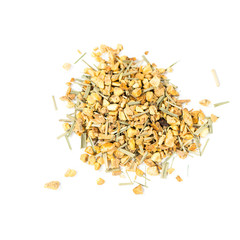 pile of natural herbal tea mix contains slices of ginger, lemon grass and zest