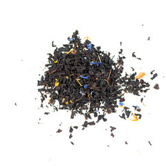 pile of natural black tea mix contains sunflower and cornflower petals, dried pieces of papaya and pineapple