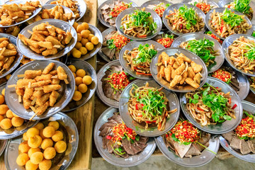 Delicious pork ear snacks and fried chicken skewers.Chinese food.