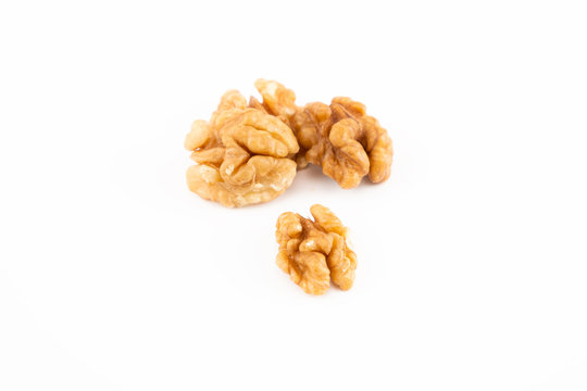 Walnuts on the white background