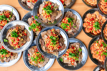 Delicious dried beef slices cold dish,the ingredients are red pepper and garlic with coriander.Chinese food.