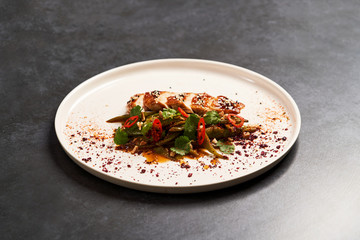 Spicy chicken breast with minted green beans, close-up