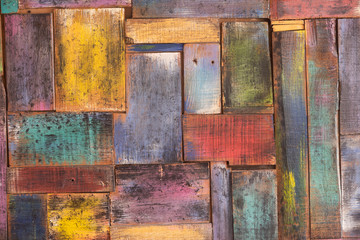 Old wooden boards of various colors. Colorful wooden background. Horizontal photo
