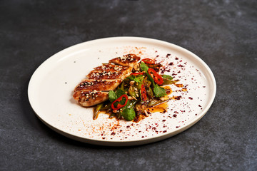 Spicy chicken breast with minted green beans, close-up