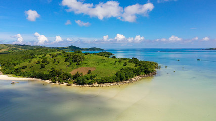 Tropical island with a white beach. Caramoan Islands, Philippines. Beautiful islands, view from above. Summer and travel vacation concept.