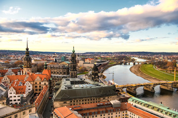 Fototapeta na wymiar Panorama of Dresden city with bridges over Elbe river at sunset from lutheran church of Our Lady Frauenkirche, Germany.