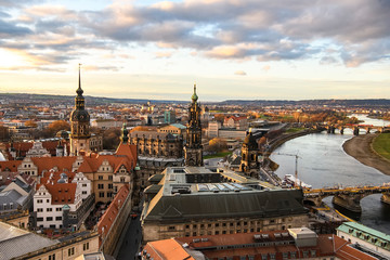Naklejka na ściany i meble Panorama of Dresden city with bridges over Elbe river at sunset from lutheran church of Our Lady Frauenkirche, Germany.