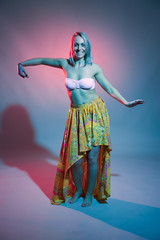 Obraz na płótnie Canvas Blonde dancer in bellydance outfit
