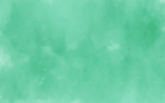 Mint green background. Studio photography screen. Watercolor abstract backdrop. Tekstured painting on the wall. Subtle and delicate color. Neo-mint actual trend.