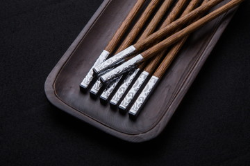 Wooden chopsticks inlaid with metal texture
