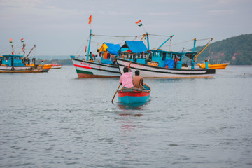 Naklejka na ściany i meble Fishing boats at sea in India