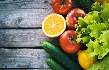 Background with fruits and vegetables on wooden table. Healthy concept. Diet. Vegan background