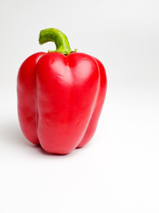fresh juicy red pepper, isolated on white background.