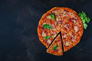 pizza salami sausages (tomato sauce, cheese, meat). food background. top view. copy space