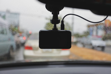 video camera recorder inside car driving rainy day