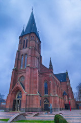 Fototapeta na wymiar Historische Backsteinkirche in Papenburg