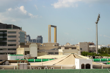 View of the old town of Dubai. In the background is the largest frame in the world