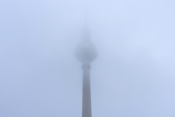 Television Tower in in central Berlin, Germany. Berlin TV Tower in the fog in the fall.