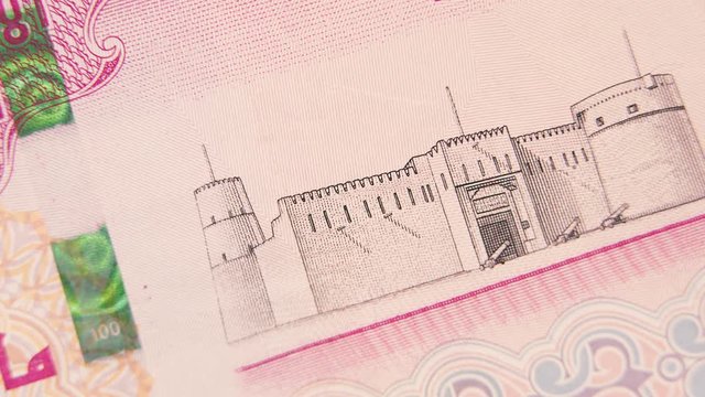 macro stop motion of the United Arab Emirates currency 100 dirhams , 4K UHD video footage.