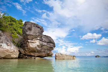 Fototapeta na wymiar Rocks by the sea on Caramoan Island, Philippines, Asia. Beautiful seascape.
