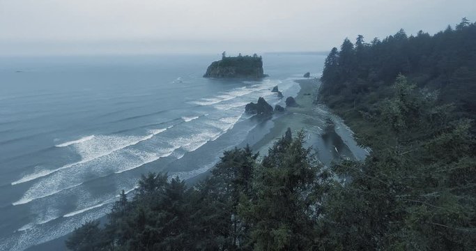 Aerial shot of Abbey Island away from a rocky shore (Ruby Beach, Olympic National Park, Washington, USA)