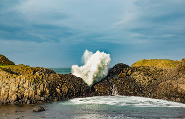 Explosion of water, Ballintoy Harbour, Causeway Coast, Antrim, Northern Ireland