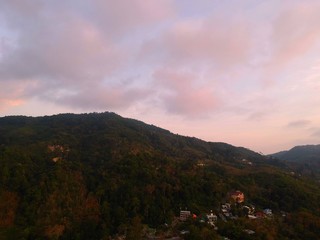 Panoramic Aerial View of Patong Mountains Phuket Thailand with the Sunset creating many beautiful colours