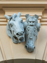 Head of a horse above the entrance of a building