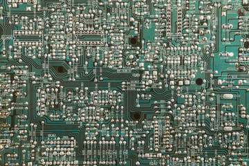Chip green printed circuit board with the image of contacts