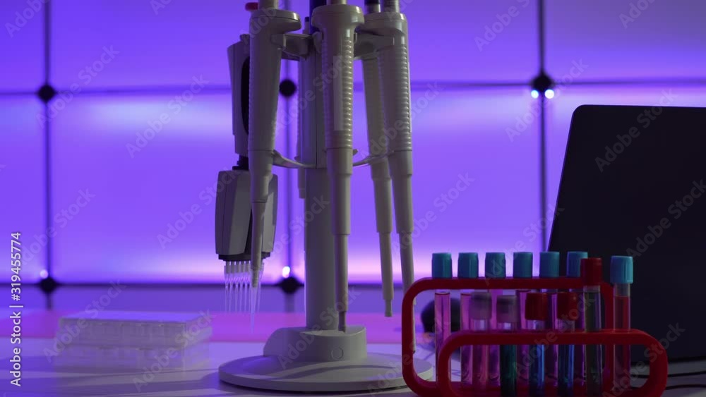 Poster Workbench in microbiological lab with PCR machine