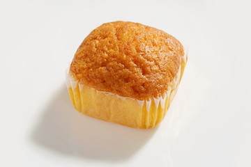 Homemade fluffy bread and biscuits on a white background