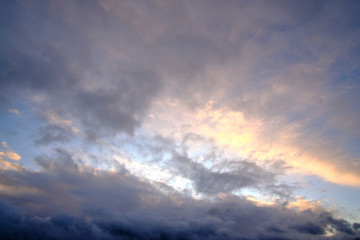 Naklejka na ściany i meble Beautiful sky with clouds at sunset