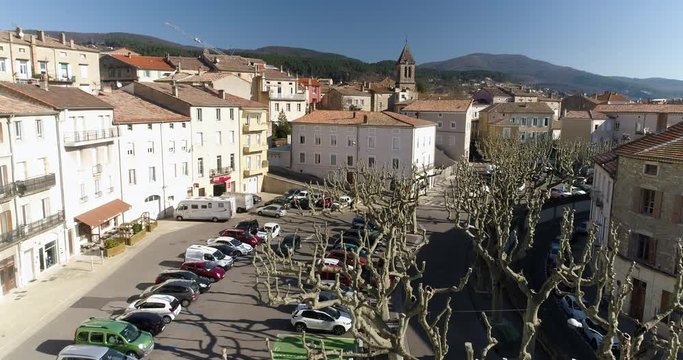 Close aerial shot of Privas, Ard&egrave;che, a small French town with nice trees in foreground