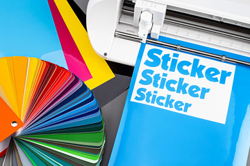 production making sticker with plotter cutting machine CMYK cyan blue colored vinyl fim with color fan. guide. Advertising Industry diy design concept background. - obrazy, fototapety, plakaty