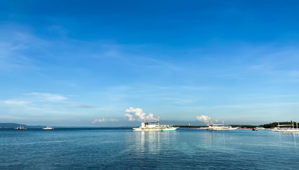 Obraz premium Monochrome beautiful landscape of blue sky,sea.Boats,ship drift in ocean