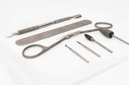 manicure tools are dried on a napkin after disinfection